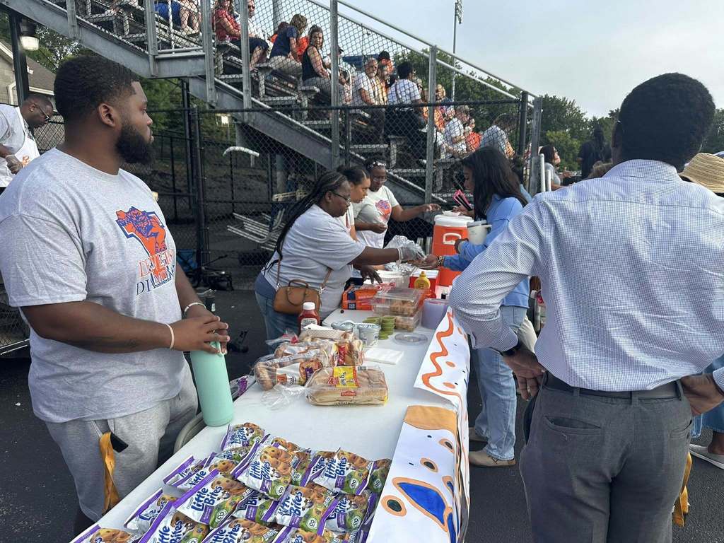 District staff handing out food at the School District of the City of York's 2025-2026 Opening Kick-Off Day.