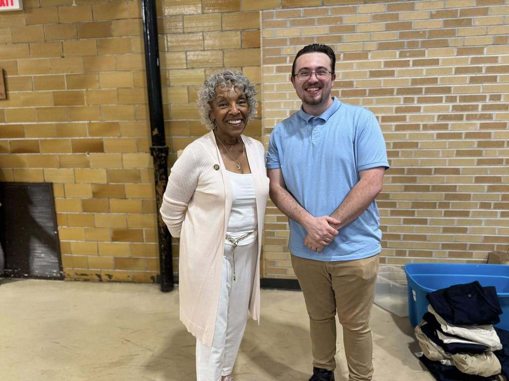 Representative Carol Hill-Evans posing for a photo with a district staff member at Davis PreK-8's Back to School Night.