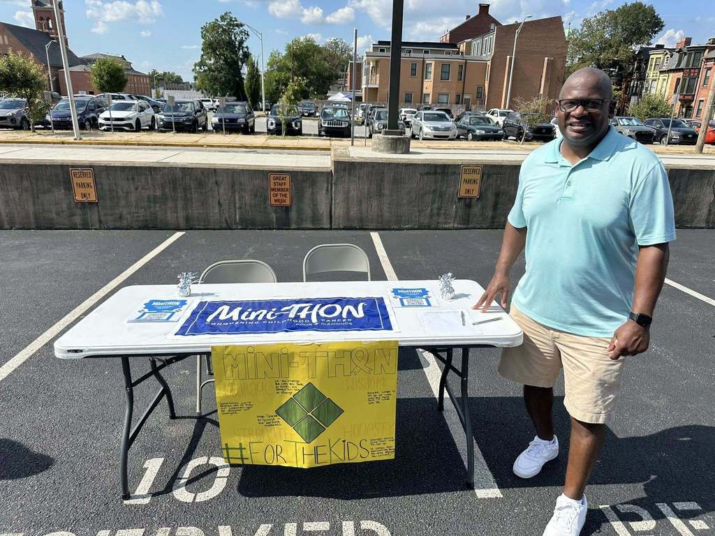 Mini-thon Advisory at William Penn Senior High School's Back to School night, standing next to their table.