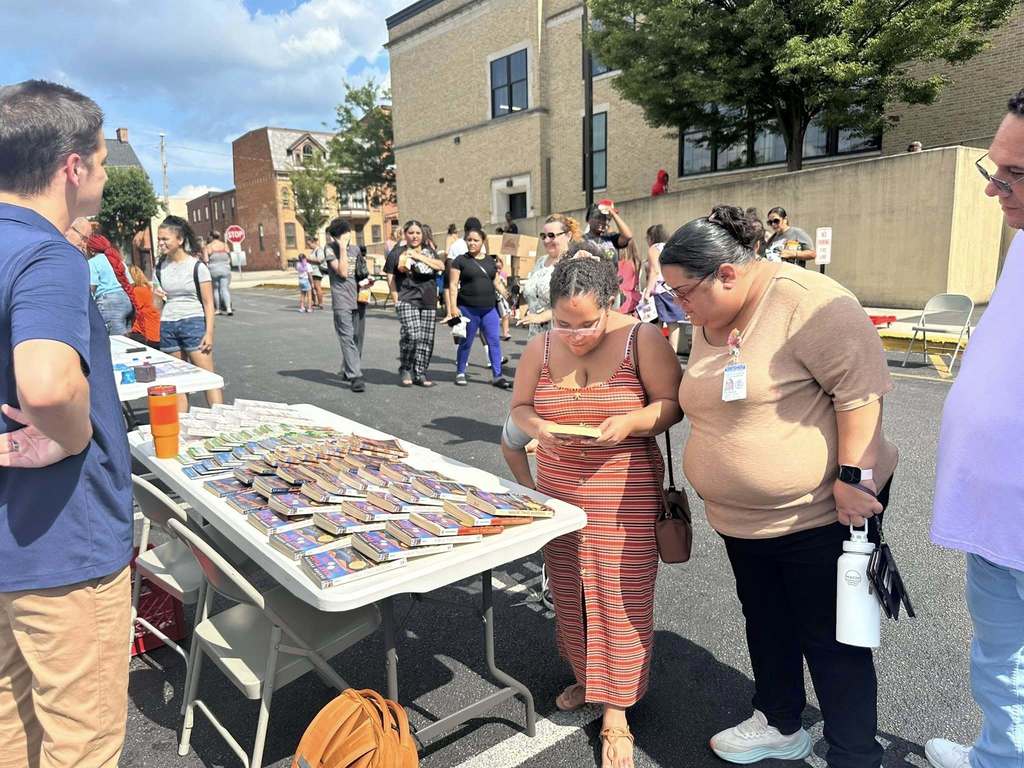 Families at the back to school night at William Penn