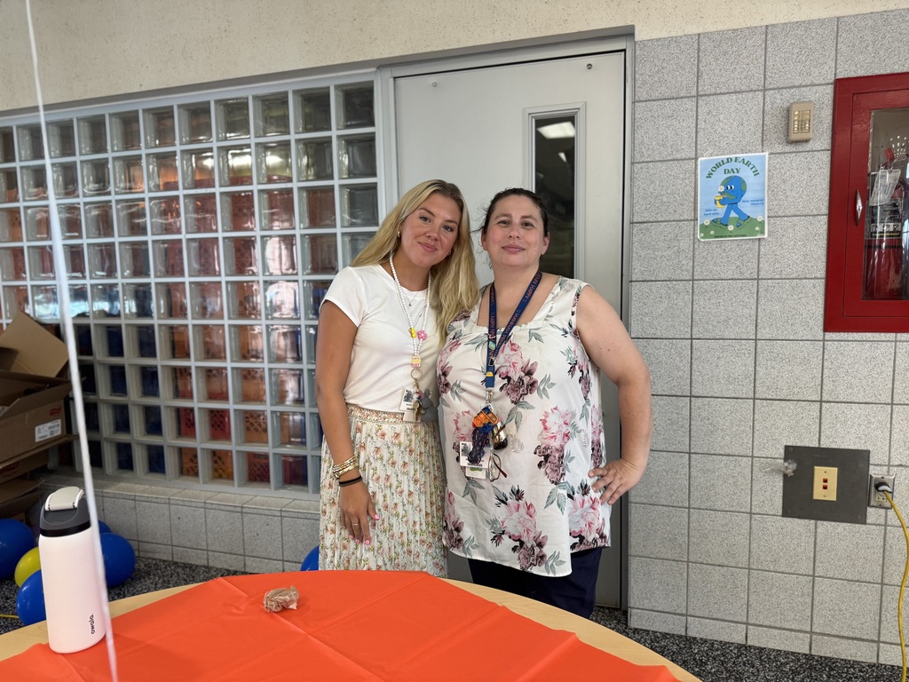 Two staff members posing together at Hannah Penn's recent Back to School Night.