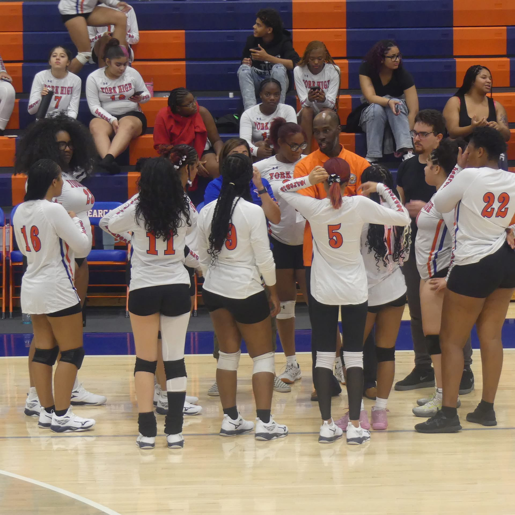 Bearcat Volleyball team and one of the coaches during their first game of the 2025 Fall Season.