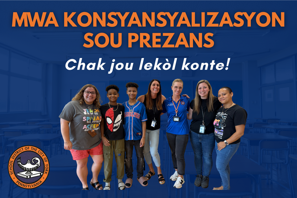 A diverse group of students and staff stands together in a classroom, promoting Attendance Awareness Month with enthusiasm.