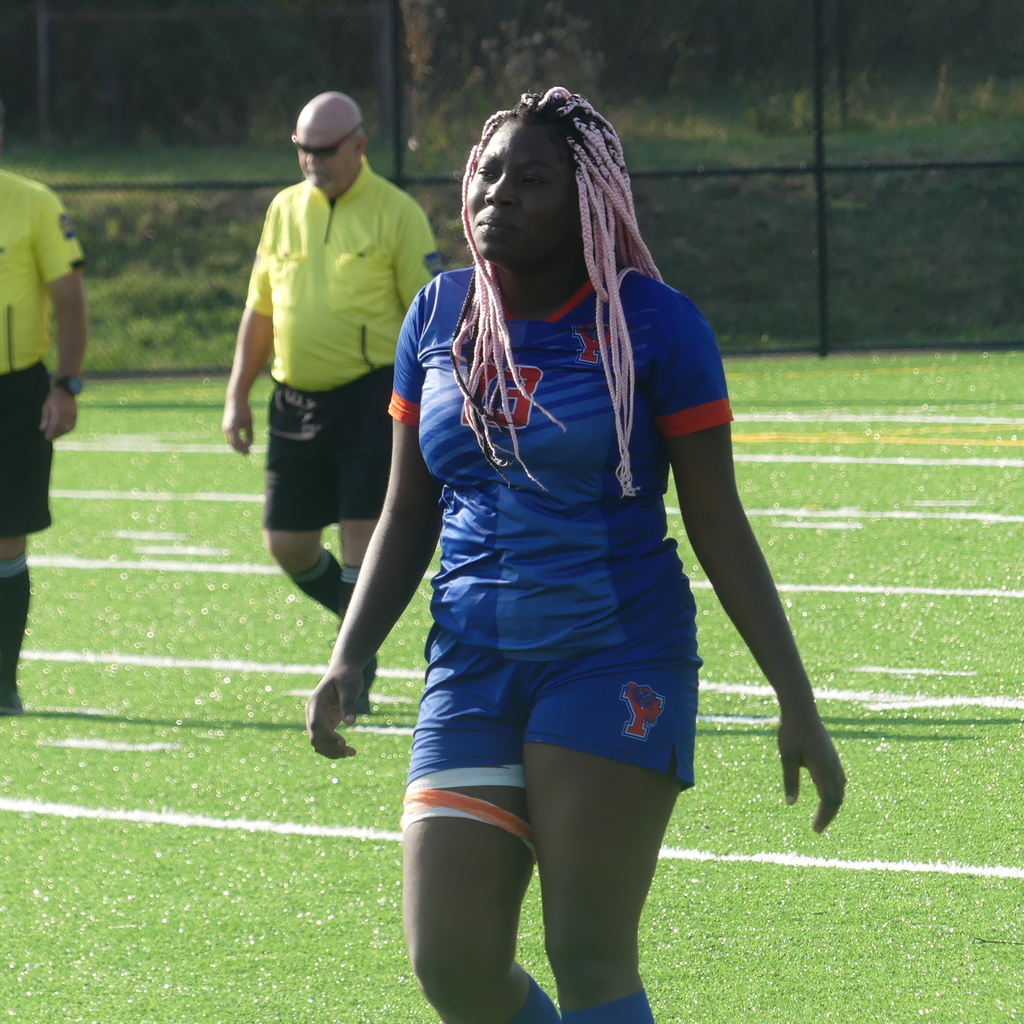 York High Girls Soccer player standing outside on the field.