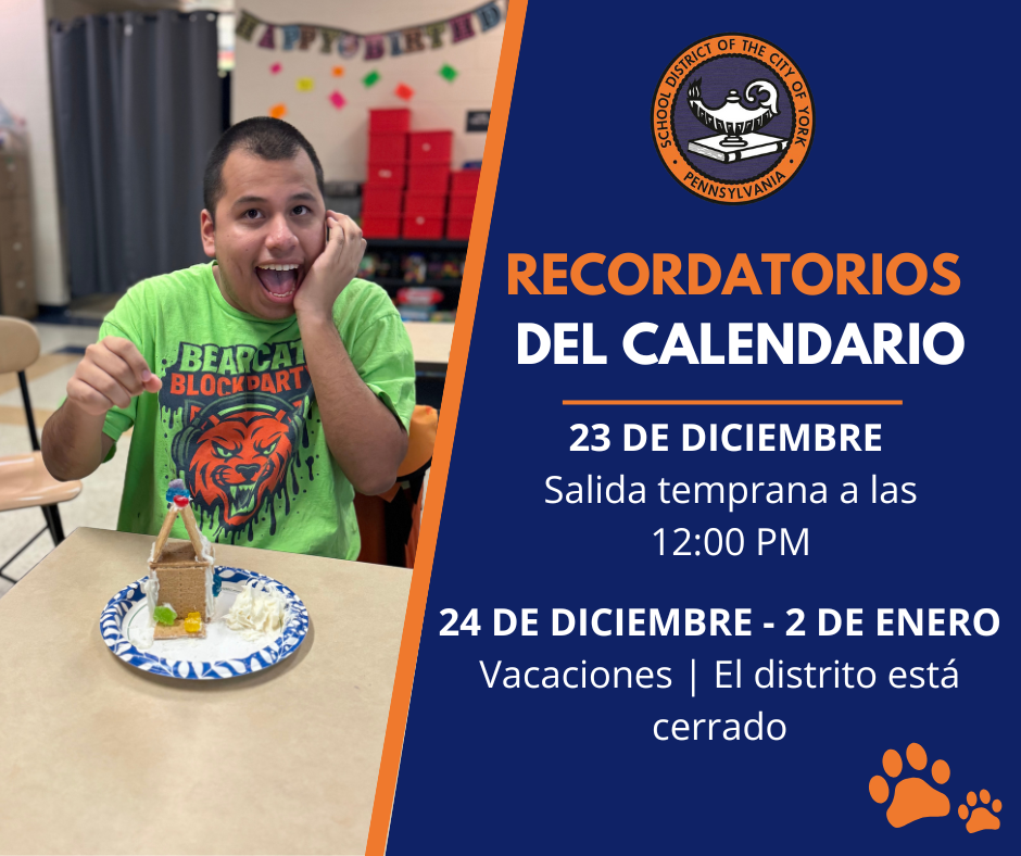 A smiling boy is sitting at a table with a decorated gingerbread house and icing. The text beside him shows school calendar reminders for December 23 and December 24 - January 2. The School District of the City of York's logo can be seen displayed above the text and a set of paw prints can be seen displayed below the text.