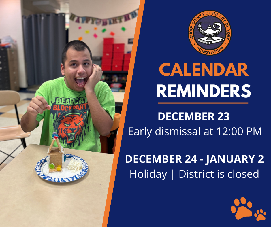 A smiling boy is sitting at a table with a decorated gingerbread house and icing. The text beside him shows school calendar reminders for December 23 and December 24 - January 2. The School District of the City of York's logo can be seen displayed above the text and a set of paw prints can be seen displayed below the text.