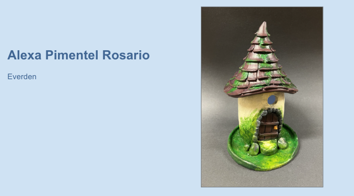 Artwork titled "Everden" by student Alexa Pimentel Rosario, featuring a whimsical miniature house with a tall, conical roof and stone doorway sits on a grassy base. 