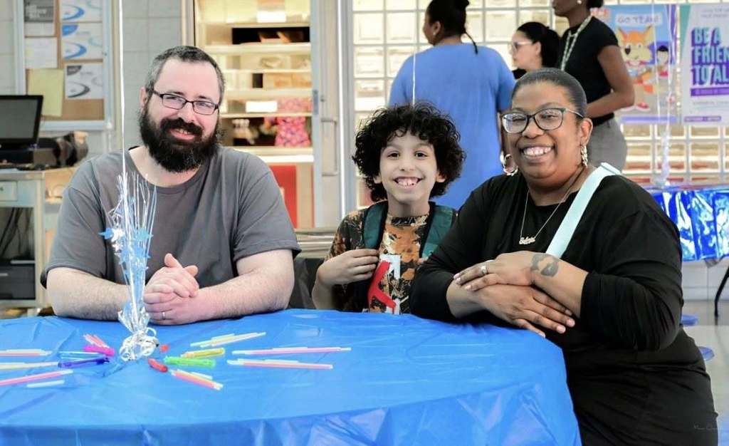 Hannah Penn PreK-8 students, families, and staff gathered in Hannah Penn PreK-8's school cafeteria for a Family Engagement event titled Harmony Night.