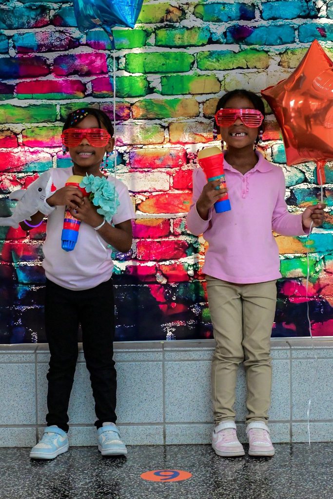 Hannah Penn PreK-8 students, families, and staff gathered in Hannah Penn PreK-8's school cafeteria for a Family Engagement event titled Harmony Night.