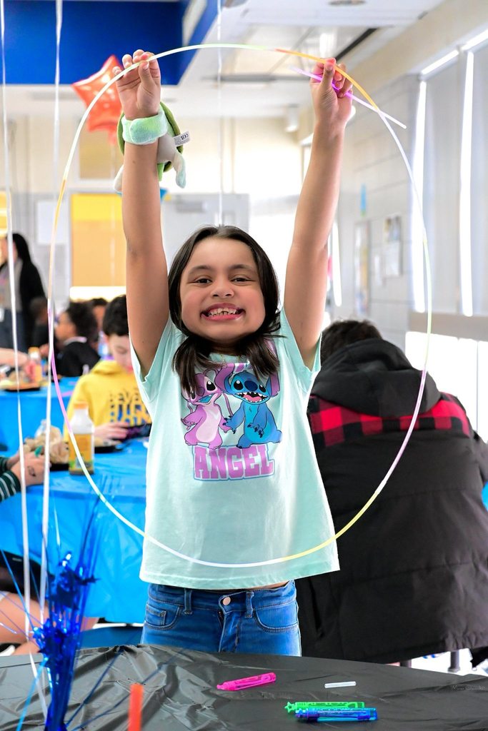 Hannah Penn PreK-8 students, families, and staff gathered in Hannah Penn PreK-8's school cafeteria for a Family Engagement event titled Harmony Night.