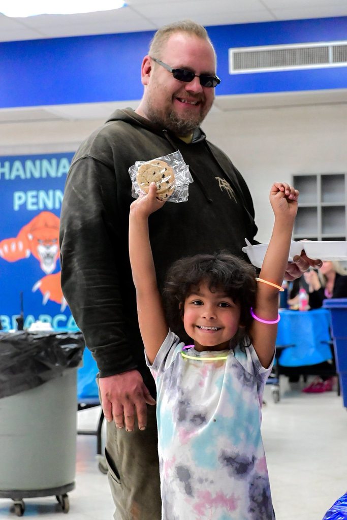 Hannah Penn PreK-8 students, families, and staff gathered in Hannah Penn PreK-8's school cafeteria for a Family Engagement event titled Harmony Night.