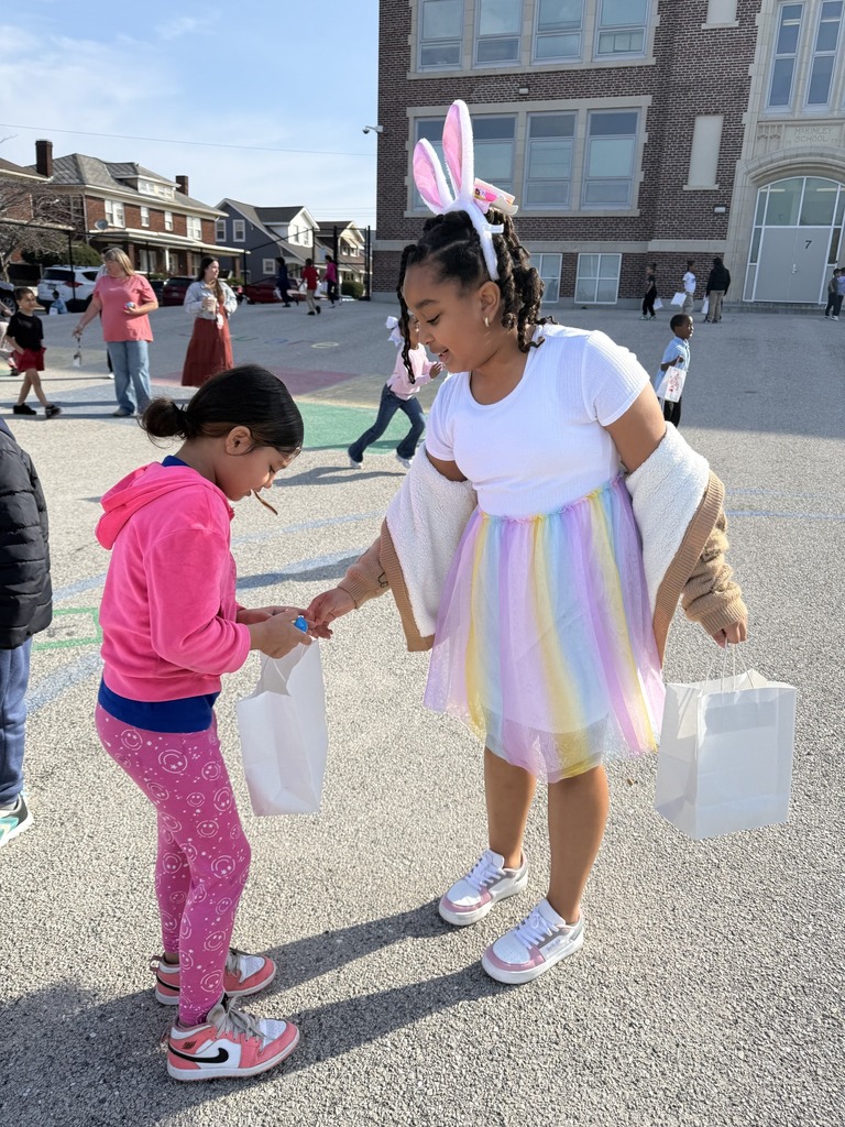 McKinley PreK-8 students are participating in a school-wide Egg Hunt outdoors. 