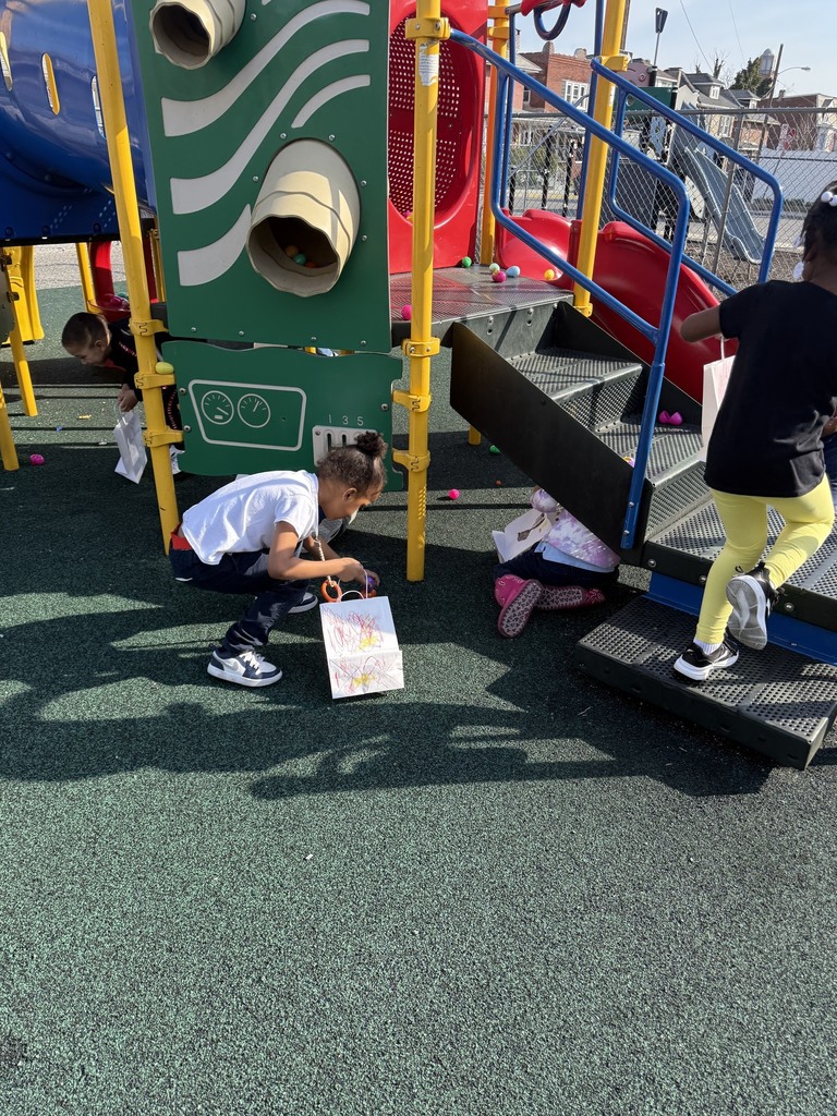 McKinley PreK-8 students are participating in a school-wide Egg Hunt outdoors. 