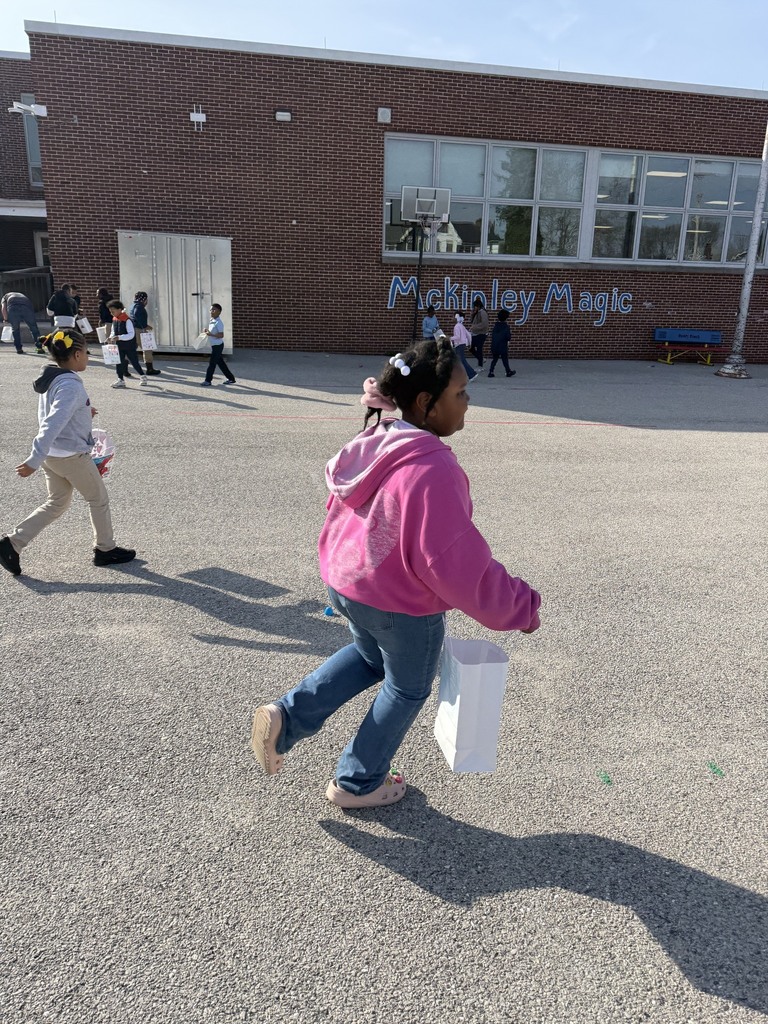 McKinley PreK-8 students are participating in a school-wide Egg Hunt outdoors. 