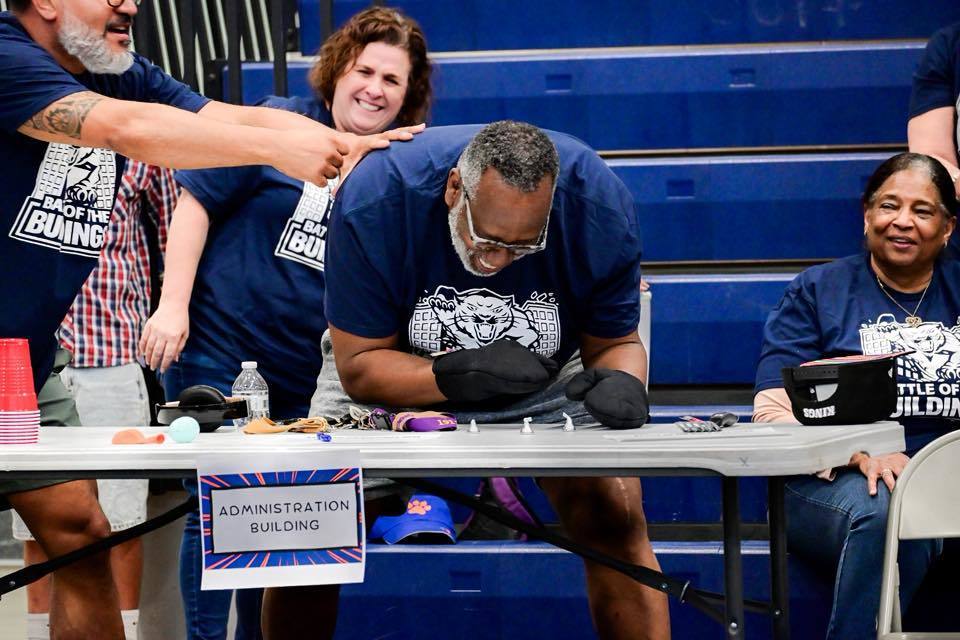 The School District of the City of York district staff members recently participated in a Battle of the Buildings event involving several Minute to Win It style games in a school gymnasium. 📸: Photography by Moises Oquendo