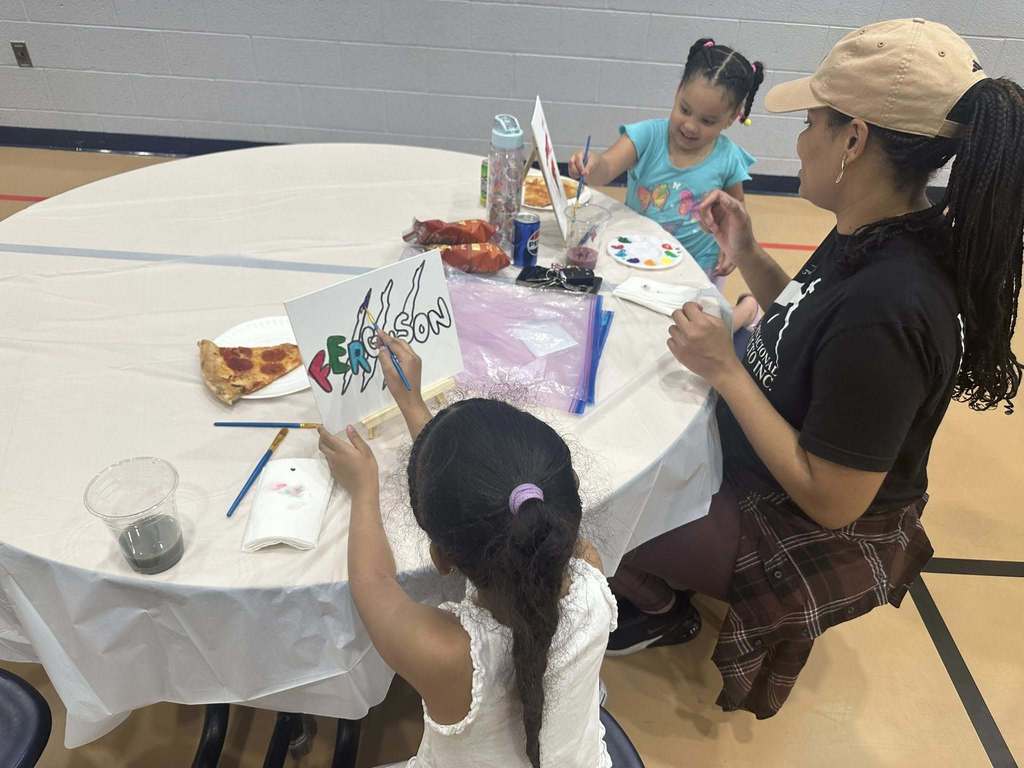 Ferguson PreK-8 families and staff recently gathered to participate in Paint Night in the Ferguson Cafeteria.