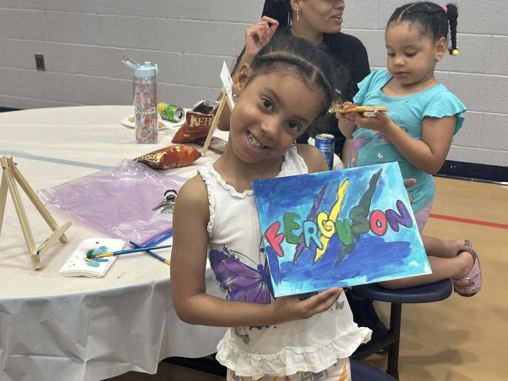 Ferguson PreK-8 families and staff recently gathered to participate in Paint Night in the Ferguson Cafeteria.