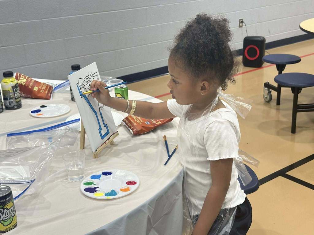 Ferguson PreK-8 families and staff recently gathered to participate in Paint Night in the Ferguson Cafeteria.