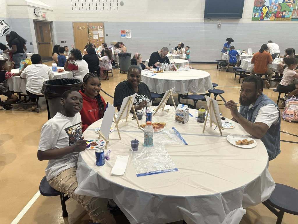 Ferguson PreK-8 families and staff recently gathered to participate in Paint Night in the Ferguson Cafeteria.
