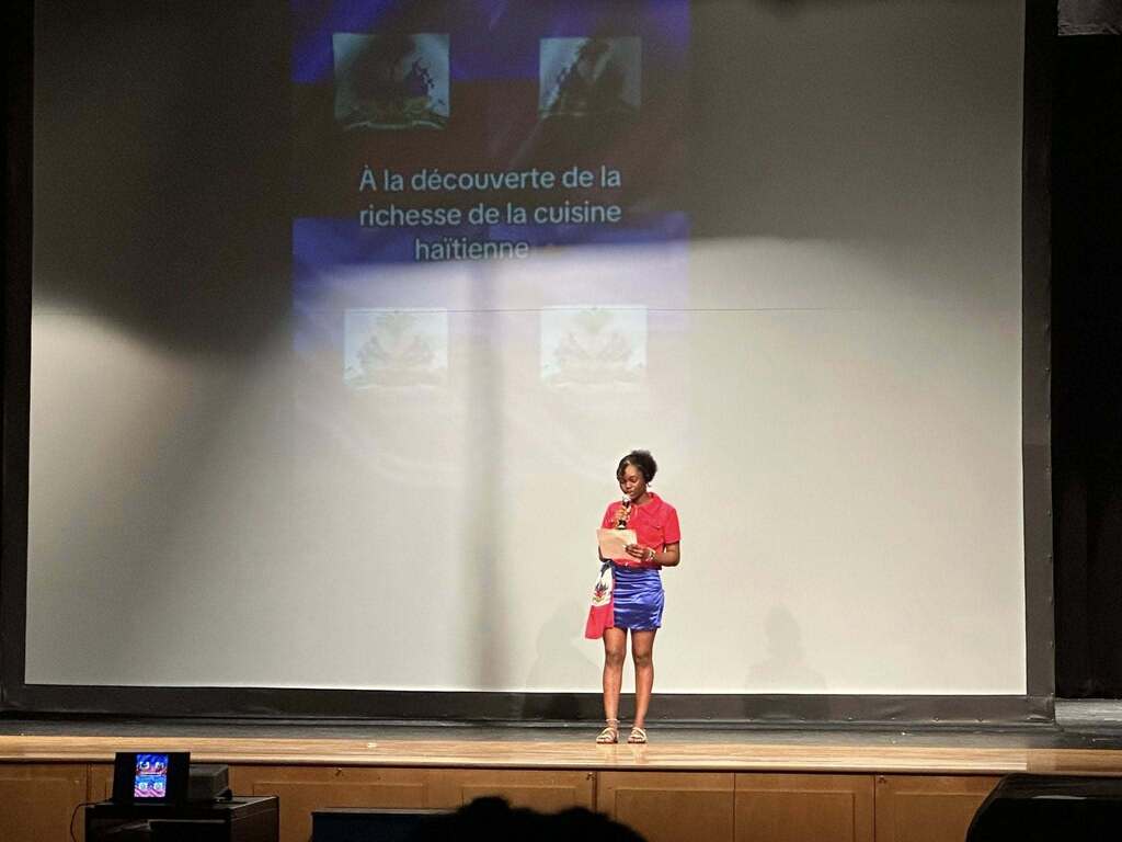 A group of William Penn Senior High School students recently performed in the high school auditorium in celebration of Haitian Flag Day.