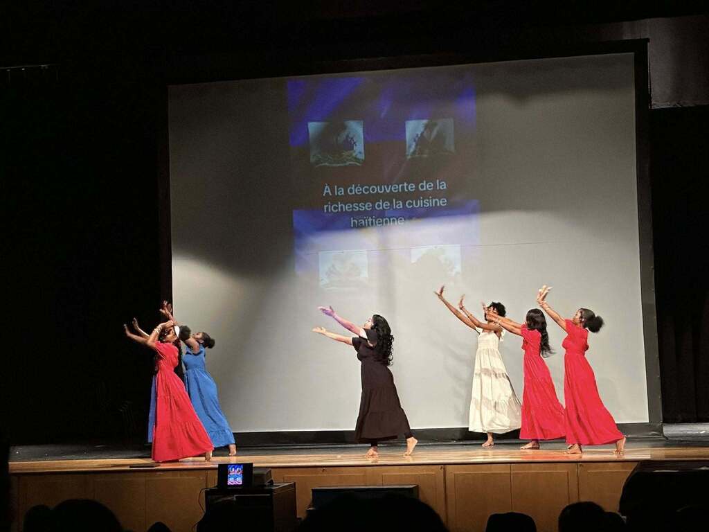 A group of William Penn Senior High School students recently performed in the high school auditorium in celebration of Haitian Flag Day.