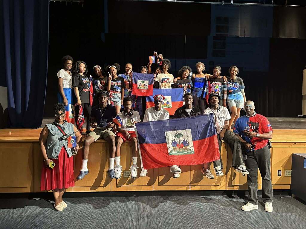 A group of William Penn Senior High School students recently performed in the high school auditorium in celebration of Haitian Flag Day.