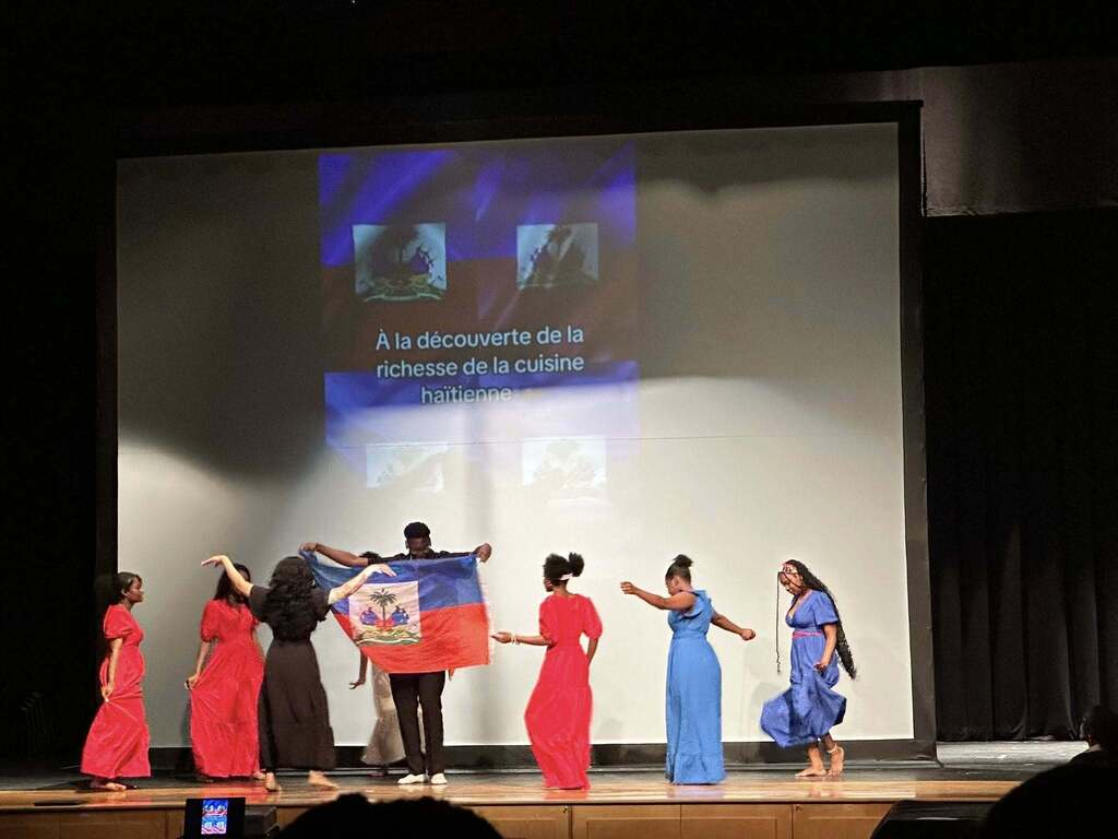 A group of William Penn Senior High School students recently performed in the high school auditorium in celebration of Haitian Flag Day.