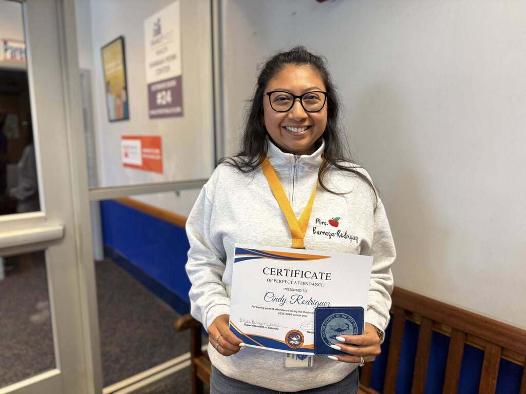 SDCY staff members recently received a certificate and a gift for having perfect attendance during the third marking period of the school year.