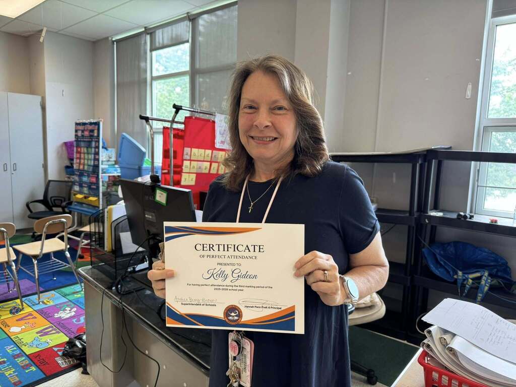 SDCY staff members recently received a certificate and a gift for having perfect attendance during the third marking period of the school year.