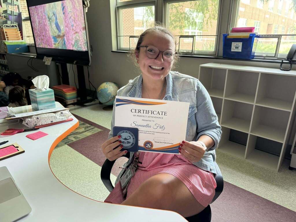 SDCY staff members recently received a certificate and a gift for having perfect attendance during the third marking period of the school year.