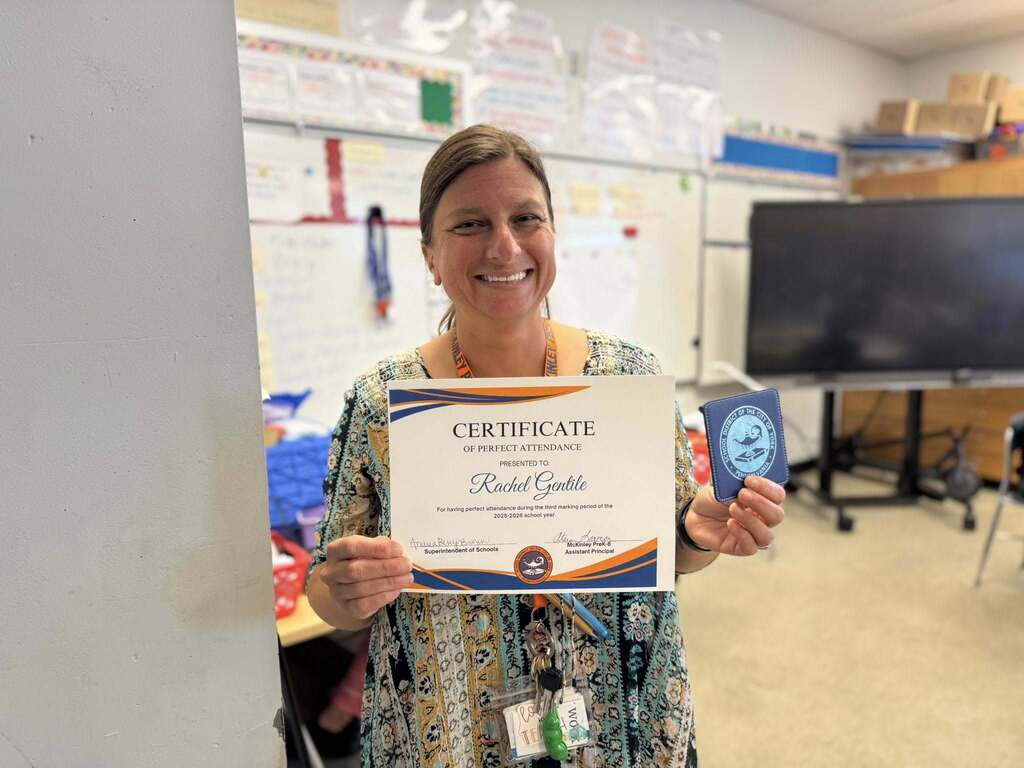 SDCY staff members recently received a certificate and a gift for having perfect attendance during the third marking period of the school year.