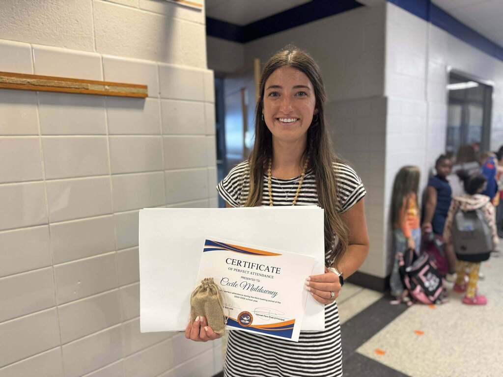 SDCY staff members recently received a certificate and a gift for having perfect attendance during the third marking period of the school year.