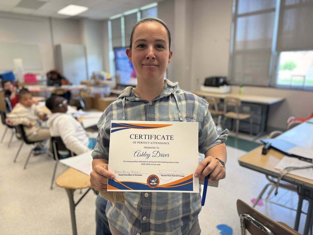 SDCY staff members recently received a certificate and a gift for having perfect attendance during the third marking period of the school year.