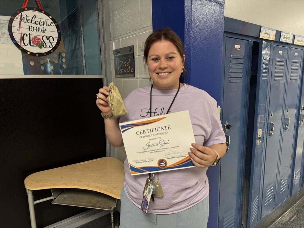 SDCY staff members recently received a certificate and a gift for having perfect attendance during the third marking period of the school year.