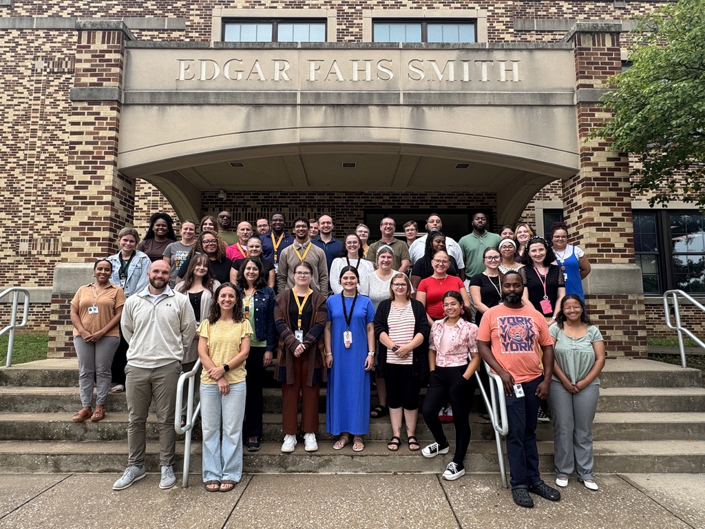 School District of the City of York staff pose for a group photo outside Smith STEAM Academy.