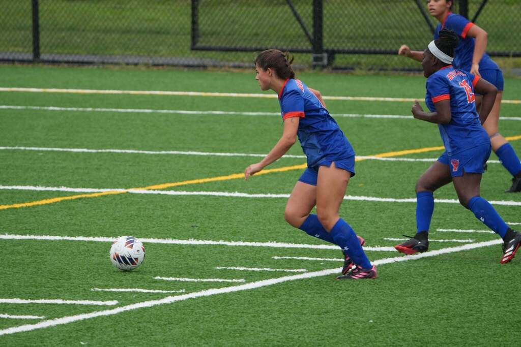 Our York High Girls Soccer team recently played against Fairfield outdoors on a field. 