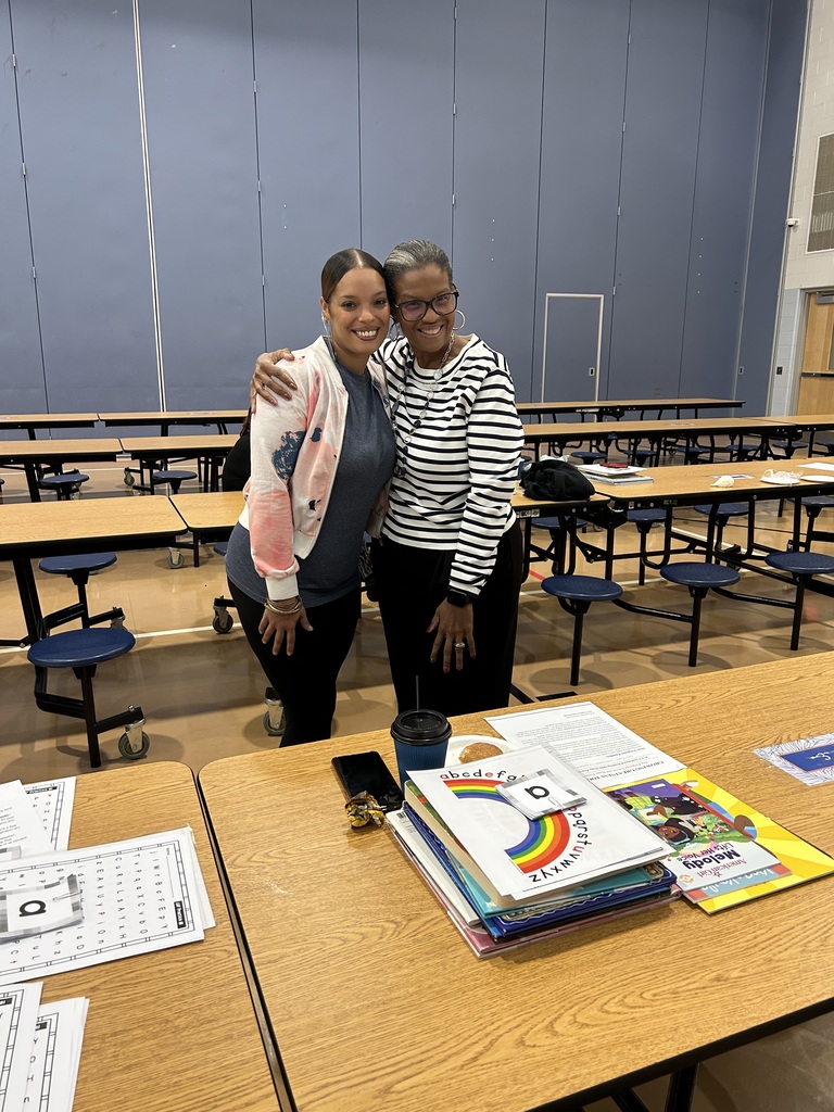 Ferguson families recently attended a literacy meeting in a school cafeteria.