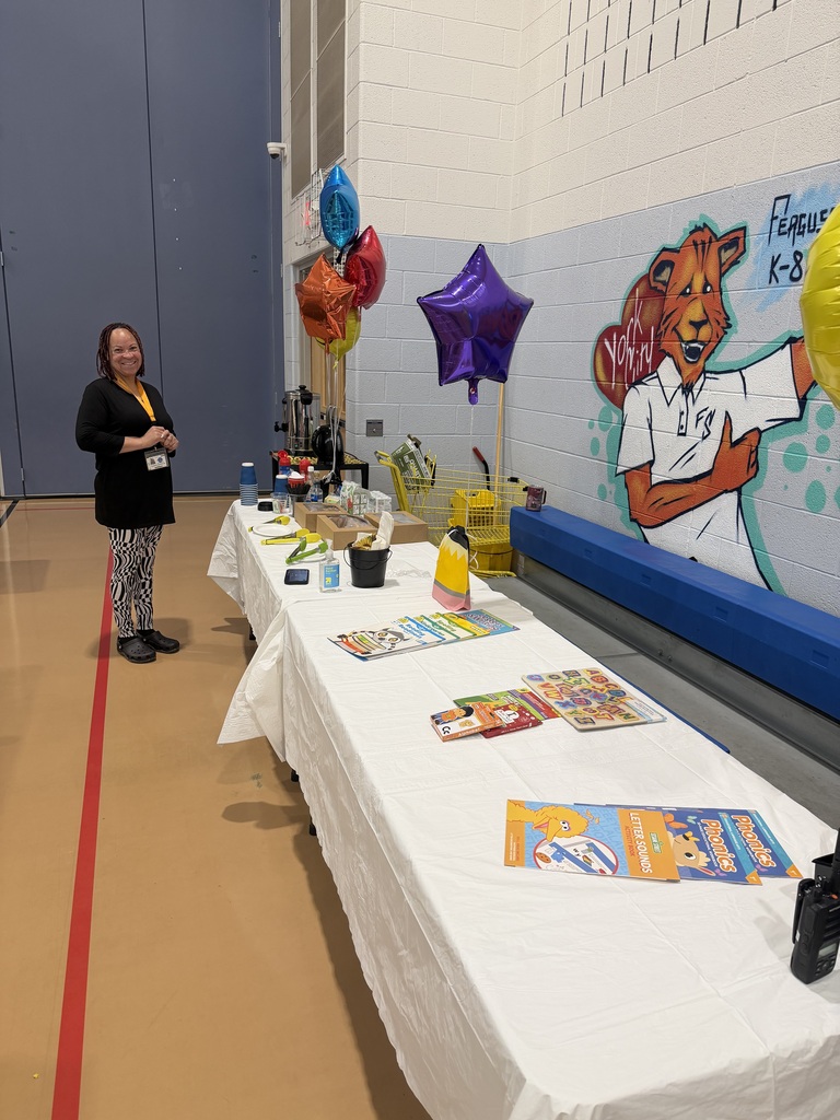 Ferguson families recently attended a literacy meeting in a school cafeteria.