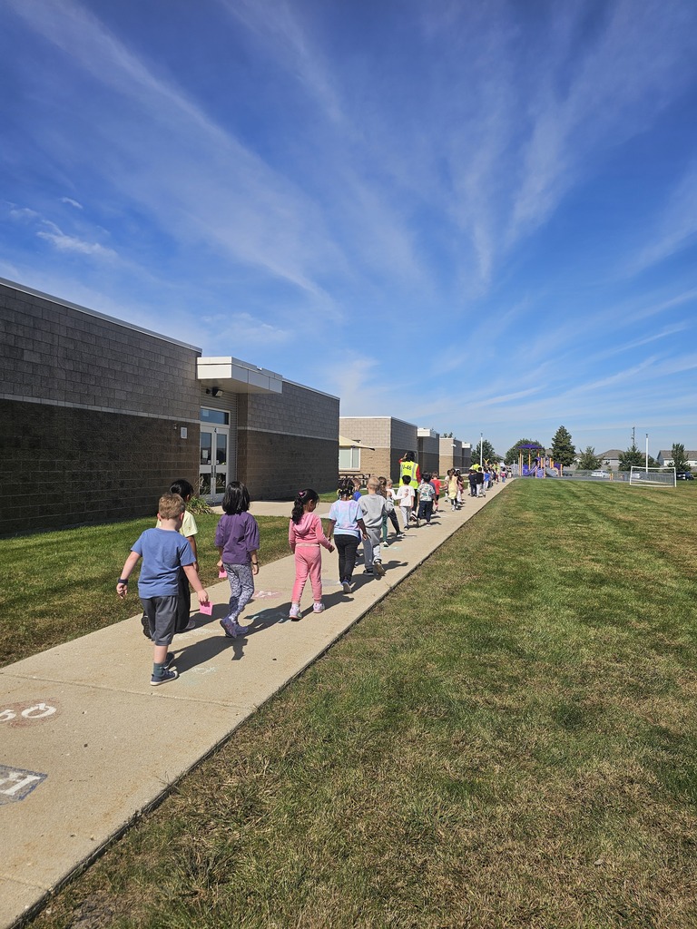 kindergarten students coming in from recess