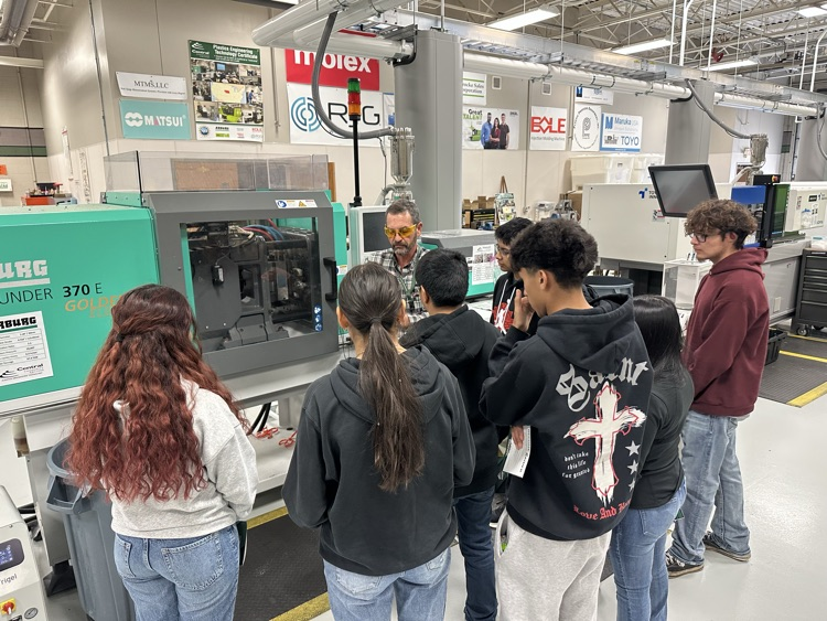 Students touring Columbus Community College machinery
