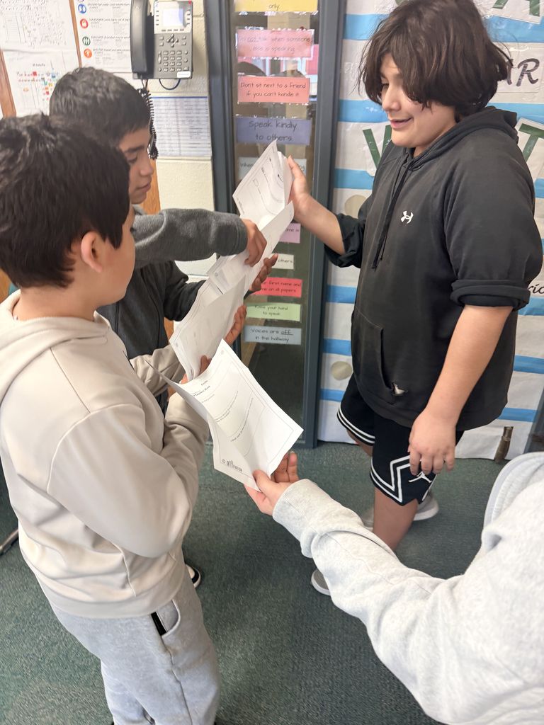 🎯🤝 Warrior Time Fun! 6th graders with Mrs. Arriola had a blast guiding a ball through a paper pipe and aiming it into the bin—no drops allowed! Great teamwork in action.