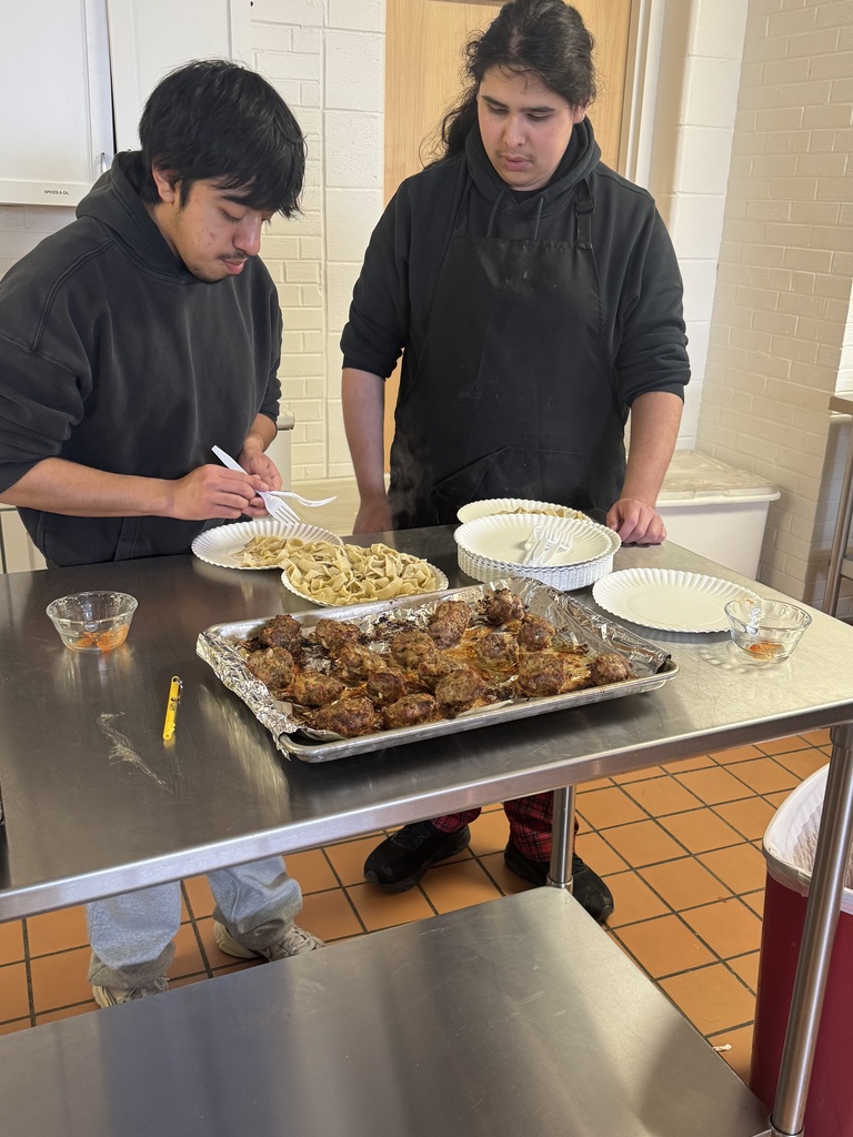 Students preparing their final dish.