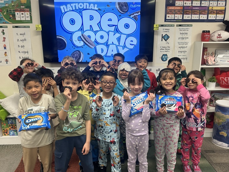 Celebrating National Oreo Day with Mr. Hayes in 1st grade!