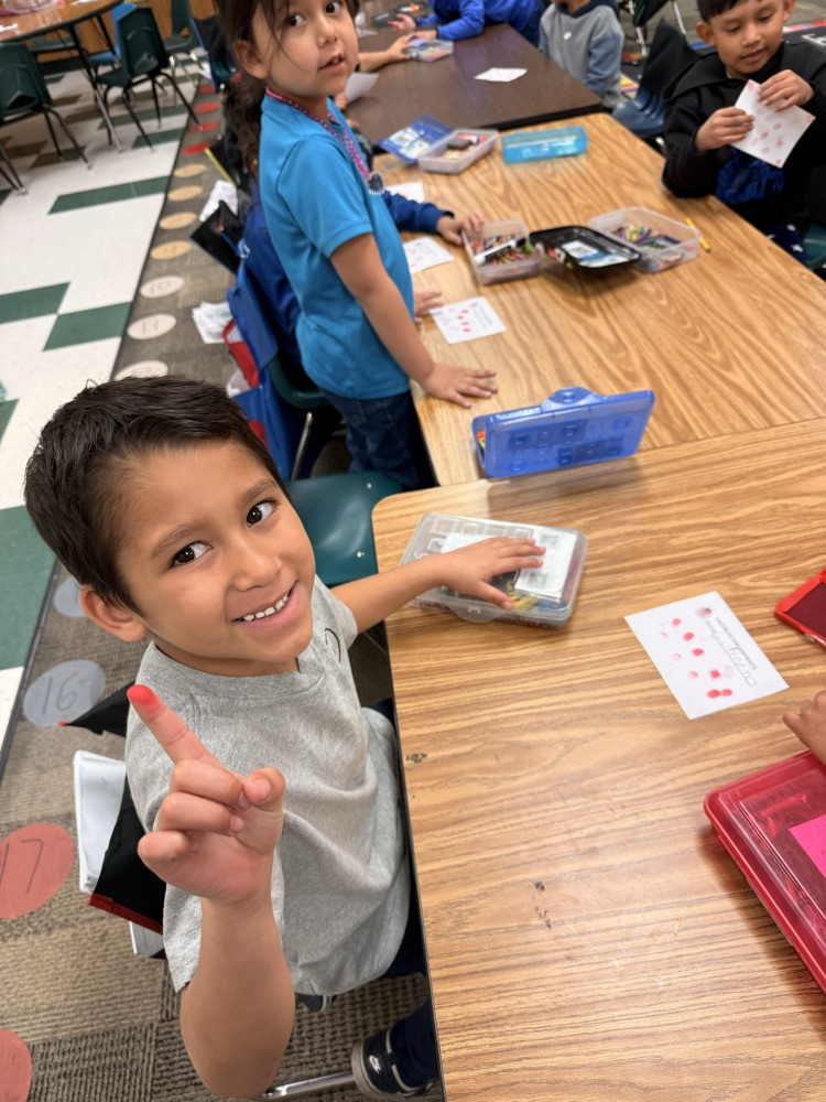 Kindergarten students learned about the life cycle of ladybugs today. They listened to a story and then created ladybug fingerprints. 🐞