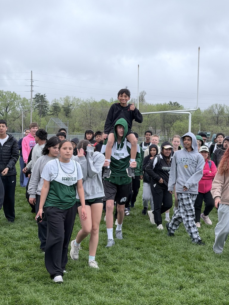 Our middle schoolers started their home track meet by lifting up each other's spirits!