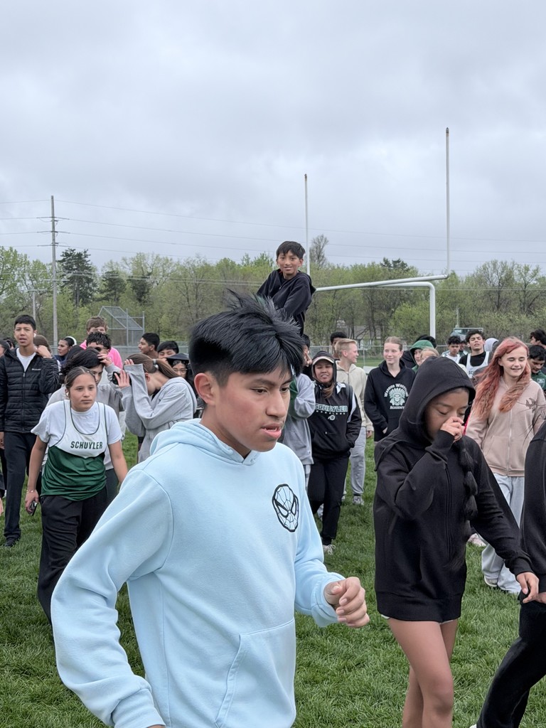 Our middle schoolers started their home track meet by lifting up each other's spirits!