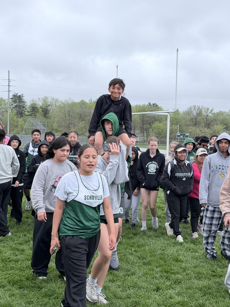Our middle schoolers started their home track meet by lifting up each other's spirits!