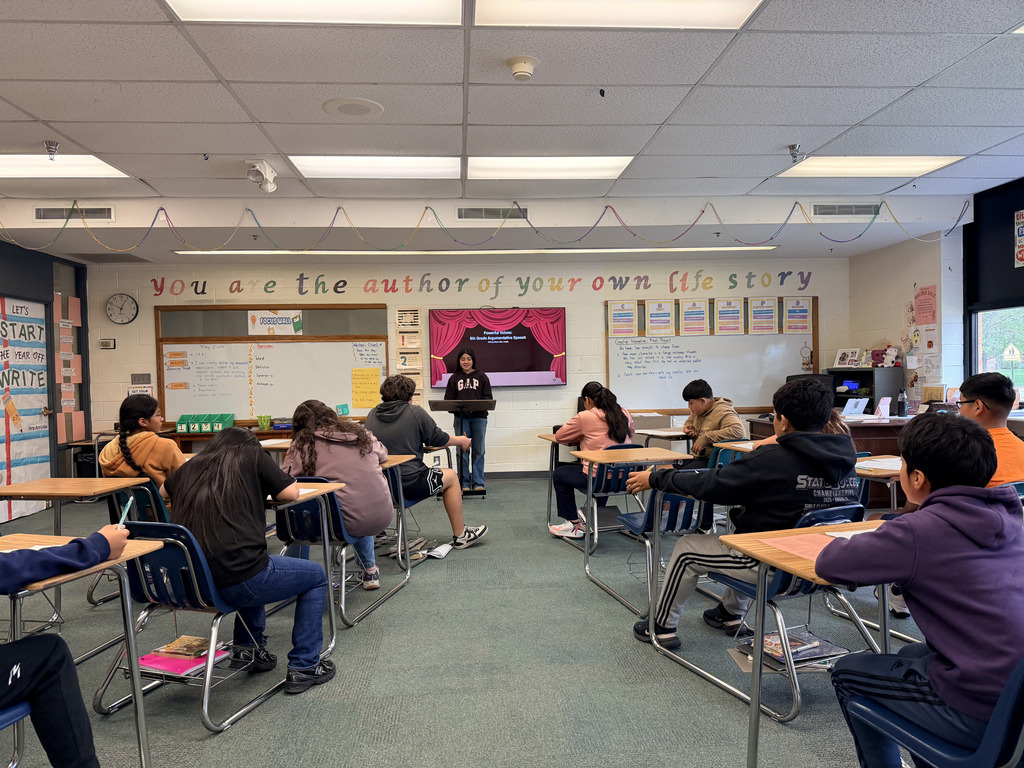 6th graders presenting powerful argumentative speeches with confidence and strong reasoning.