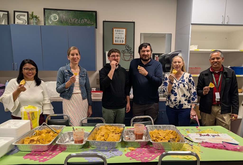 SMS teachers enjoying chips and salsa provided by El Patron for Teacher Appreciation Week