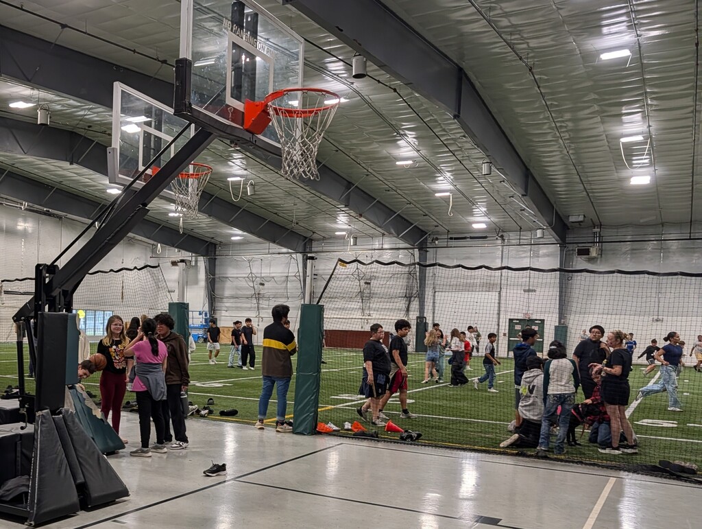 Students in Field House celebrating MAPS incentive.